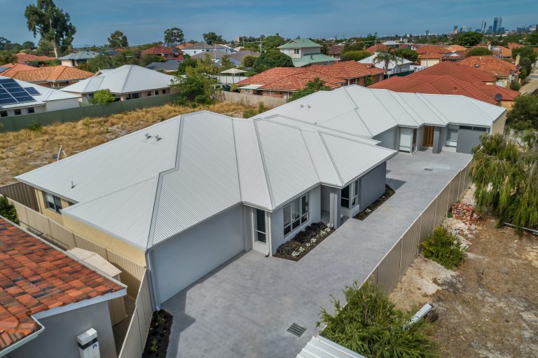 Two rear lot dwellings on a triplex site in Bedford